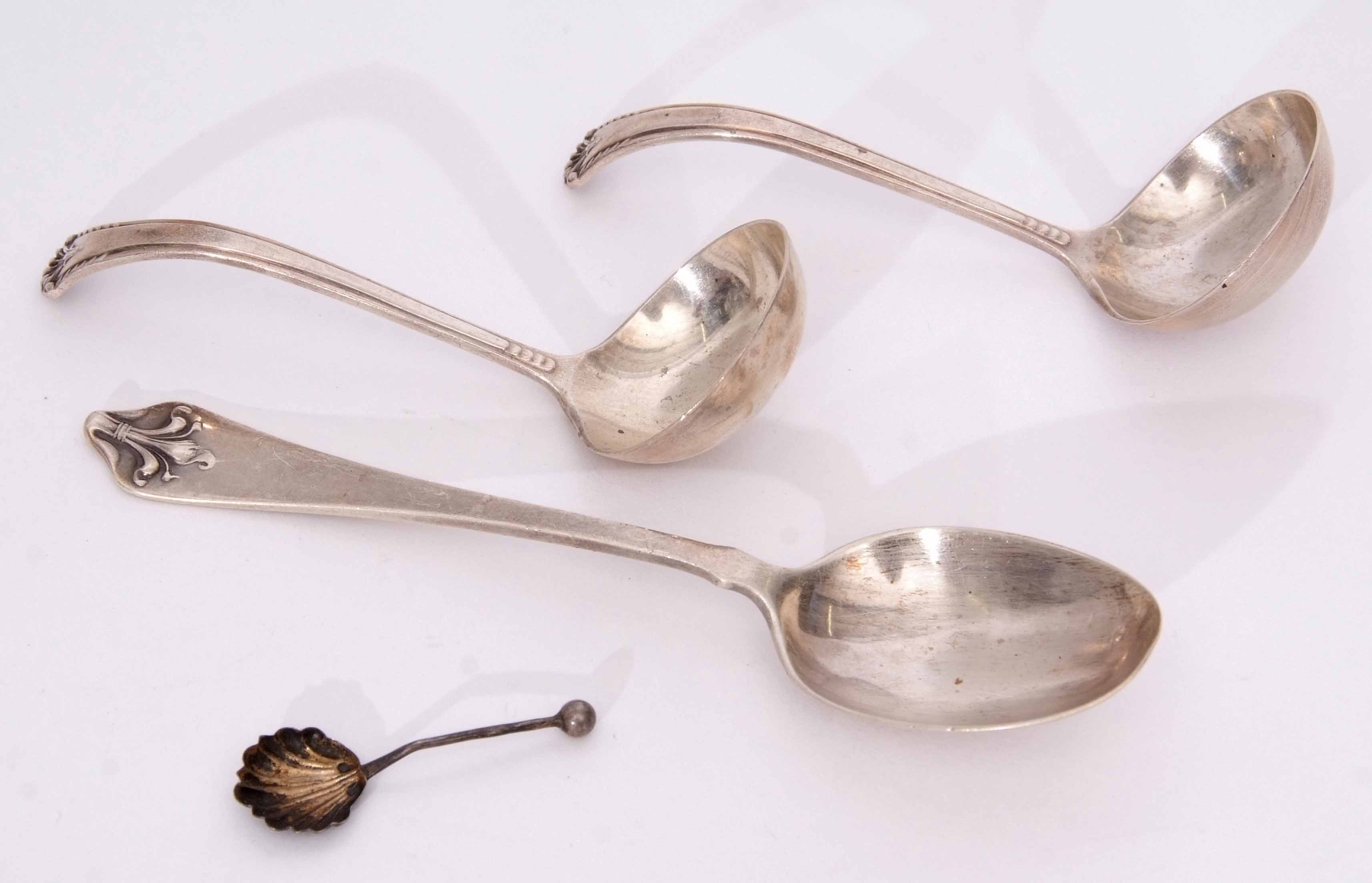 Mixed Lot: comprising a single dessert spoon together with a pair of small ladles with circular