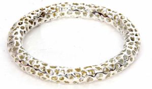 Rachel Galley "Allegro" white metal bangle, of stylised pierced design containing hidden beads, 60mm