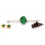 Mixed Lot: modern jade bar brooch, the carved oval panel framed in a 9ct stamped mount, 55mm long. A