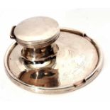 George V capstan inkwell with circular saucer base and pen rest built to the rim to an offset