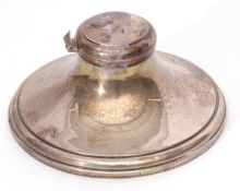 George V large capstan inkwell of typical polished circular form, the hinged cover (hinge a/f) and