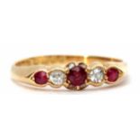 Early 20th century 18ct ruby and diamond five stone ring, alternate set with three graduated