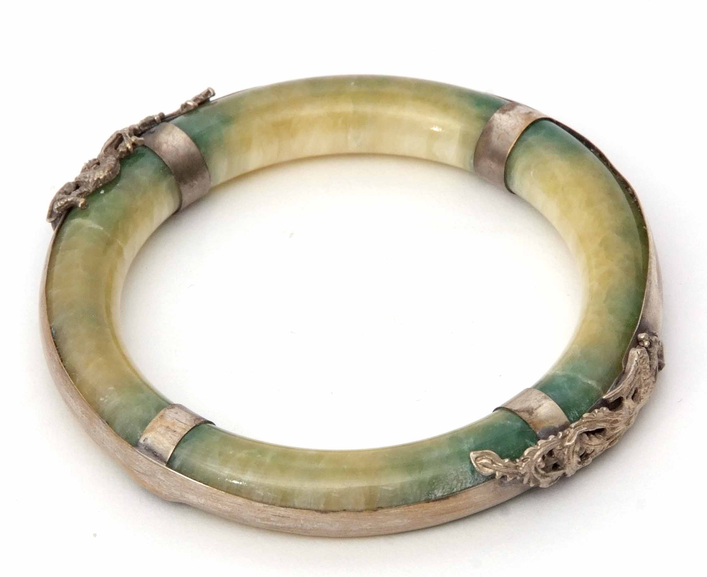 Jade type circular bangle, the surround applied with a metal dragon and mythological bird, 80mm diam - Image 3 of 3