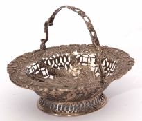 Victorian small oval table basket with shaped and embossed floral foliate and C-scroll rim to a