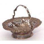 Victorian small oval table basket with shaped and embossed floral foliate and C-scroll rim to a