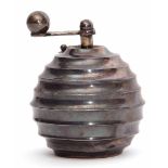 20th century Continental white metal pepper grinder of scalloped spherical form, cast and applied