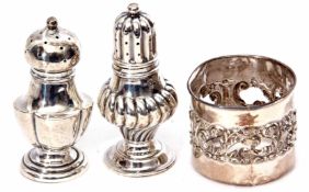 Mixed Lot: comprising two various small pepper casters, together with a cylindrical silver bottle