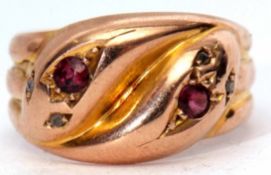 Early 20th century 9ct gold garnet and diamond serpent ring, design as two serpent heads, each