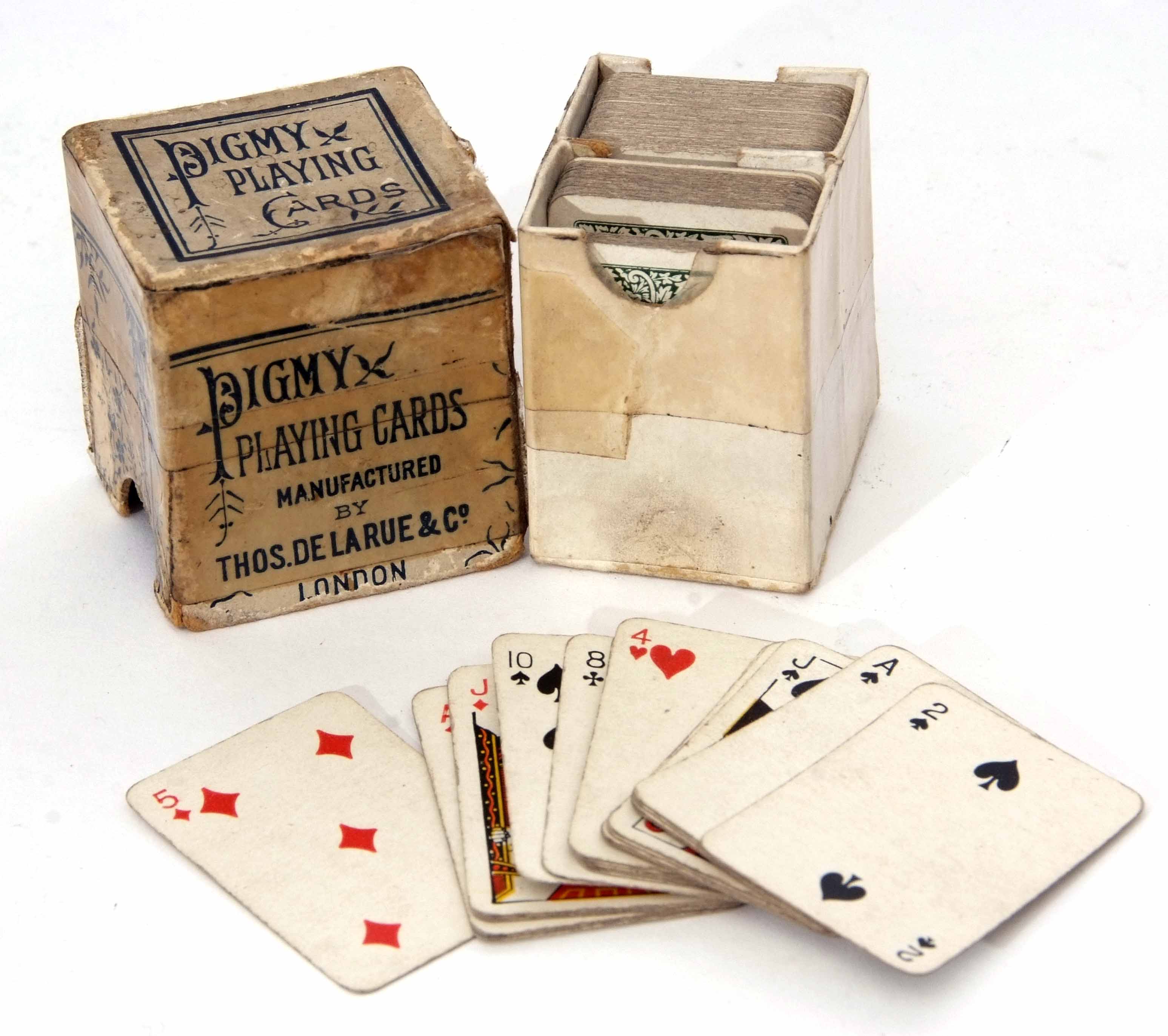 Two packs of small playing cards "Pygmy Playing Cards", manufactured by Thos de la Rue & Co - London