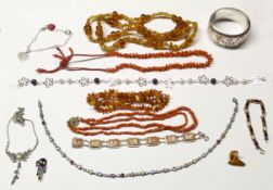 Mixed Lot: two stag coral necklaces, two modern amber fragment necklaces, cameo bracelet, sterling