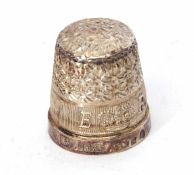 Elizabeth II commemorative silver thimble of typical form with milled band decorated with a crown,