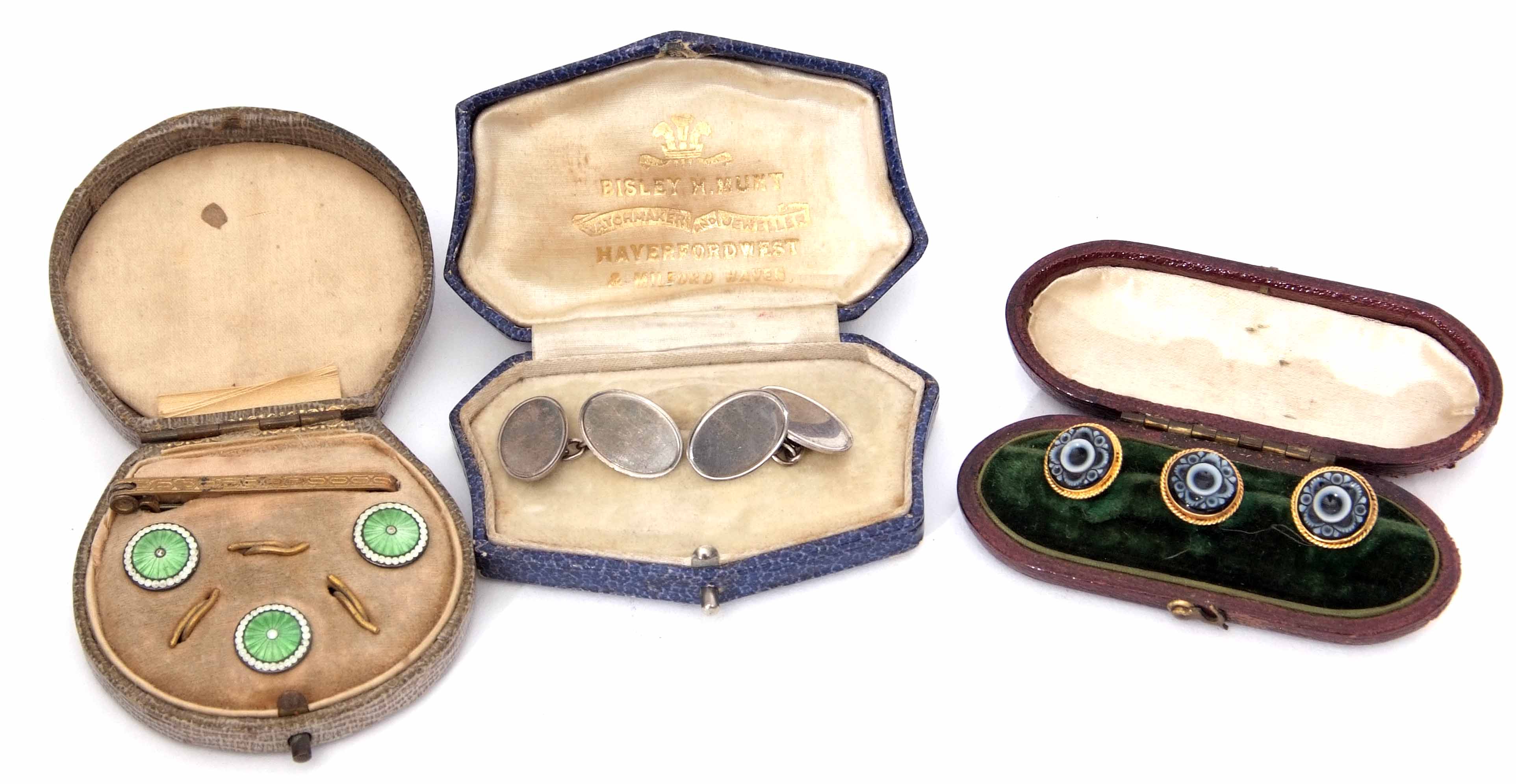 Mixed Lot: cased set of three carved sardonyx buttons, pair of hallmarked silver cufflinks, oval