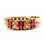 18ct gold ruby and diamond ring featuring 3 oval shaped rubies interspersed with 4 small diamonds,