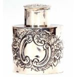 Edward VII cylindrical canister with pull off cover and decorated with embossed C-scroll floral