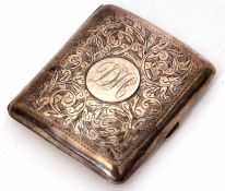 Edward VII cigarette case of hinged and sprung rectangular form with engraved foliate covers and