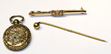 Mixed Lot: yellow metal bar brooch applied with a central crown motif, 19th century gilt metal