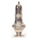 George III caster of baluster form with pierced pull off cover with cast and applied finial and