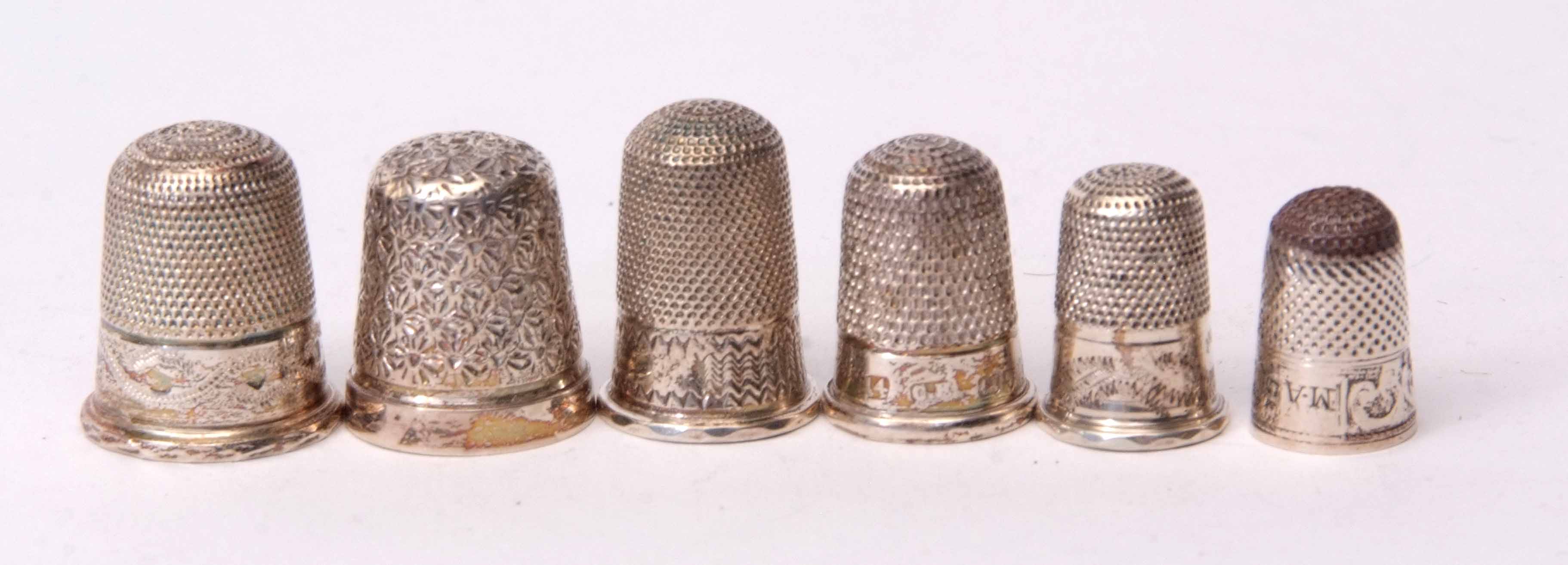 Mixed Lot: six various thimbles all of graduated sizes and comprising three hallmarked and three