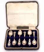 Cased set of six Edward VII coffee spoons each with pierced and engraved handles with vacant