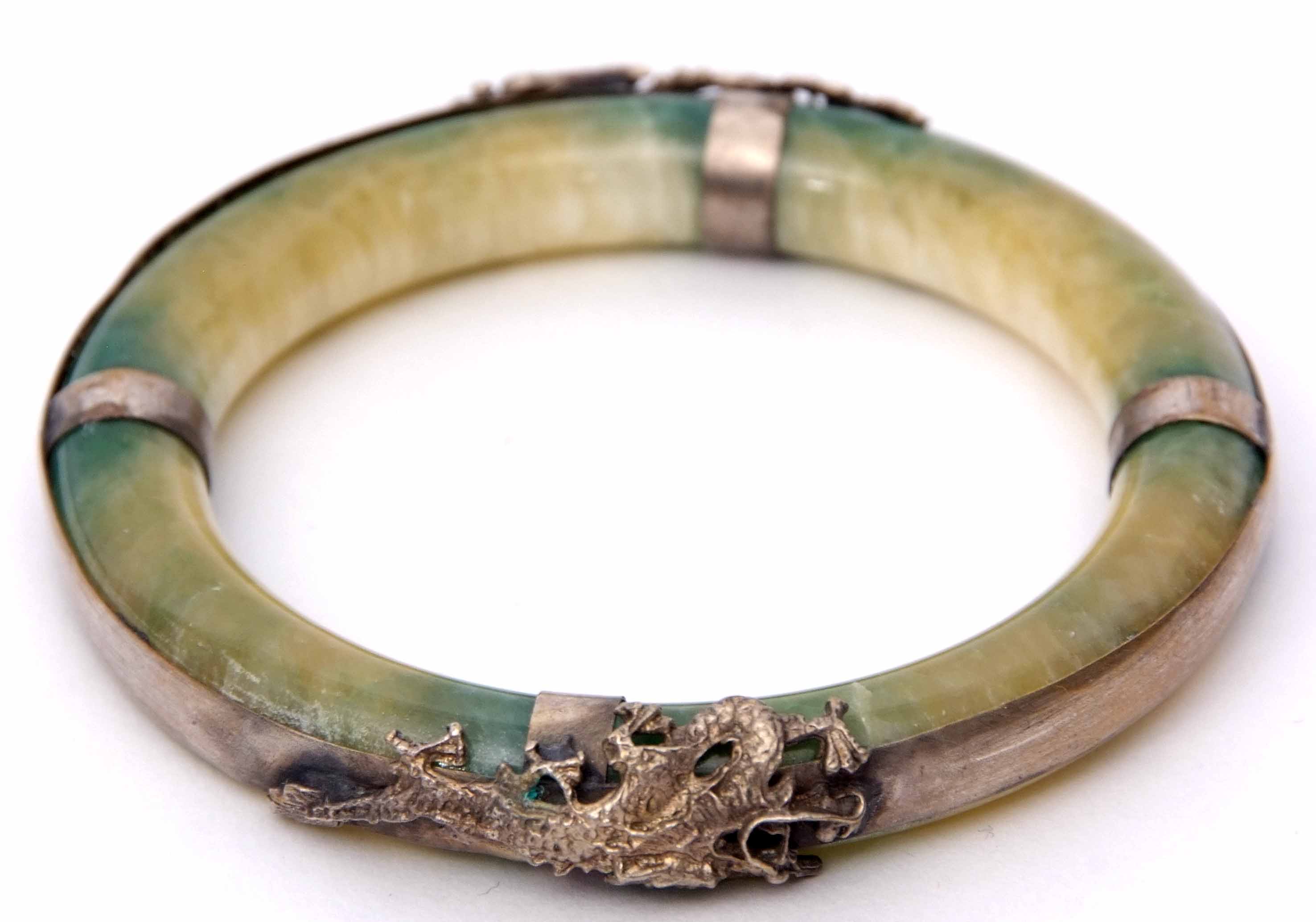 Jade type circular bangle, the surround applied with a metal dragon and mythological bird, 80mm diam - Image 2 of 3
