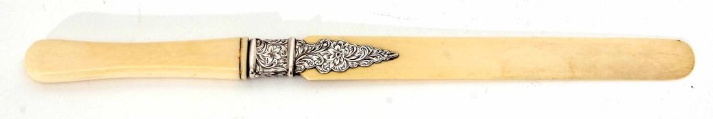 Late 19th century silver mounted ivory paper knife, the plain and polished blade to a floral and