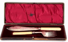 Cased set of ivory handled fish servers, each with engraved blade and tines to a ribbed collar and