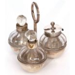 Victorian three piece breakfast cruet stand of trefoil form with central ring carry handle and