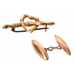 Mixed Lot: one 9ct gold torpedo cuff link with chain connector, 7.5gms, together with a 9ct gold