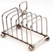 Edward VII wire work toast rack of rectangular form on compressed bun feet with plain wire work