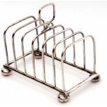 Edward VII wire work toast rack of rectangular form on compressed bun feet with plain wire work