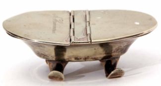 Late 19th century base metal table snuff of oval form with two hinged covers, one engraved H