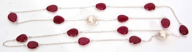 Modern white metal necklace set with sculptured rubies and baroque pearls, all framed and