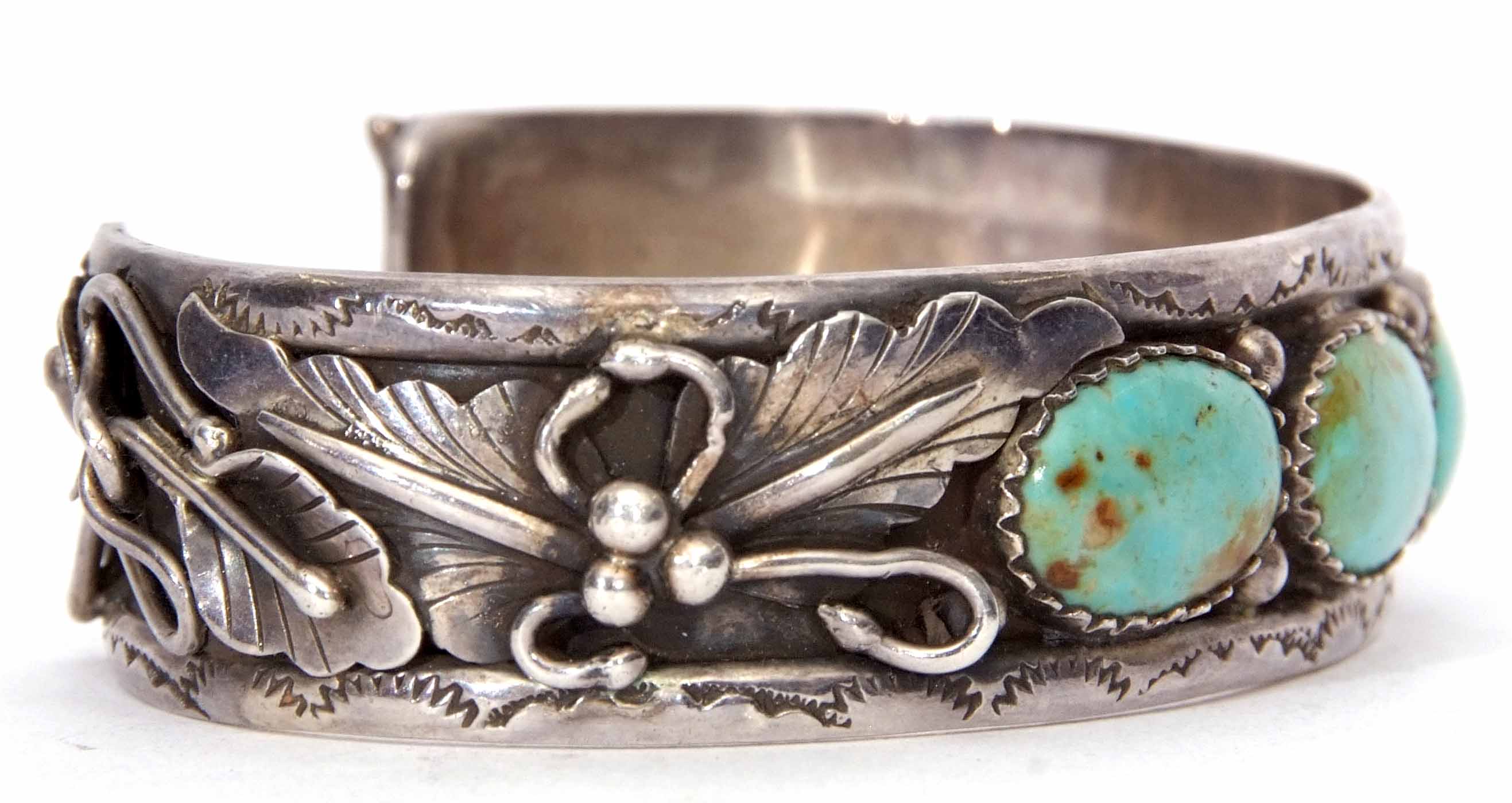 White metal and turquoise set torque bangle, an ornate leaf and bead design featuring three collet - Image 2 of 3