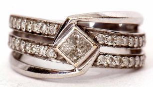 Precious metal and diamond cluster ring, the centre features four small princes cut diamonds,