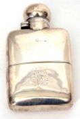 Early 20th century hallmarked silver hip flask of polished and shaped rectangular form with hinged