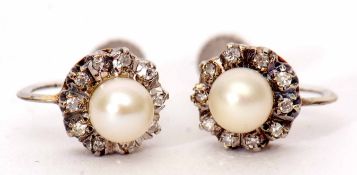 Pair of 9ct white gold diamond and cultured pearl cluster earrings of flower head design, with screw