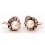 Pair of 9ct white gold diamond and cultured pearl cluster earrings of flower head design, with screw