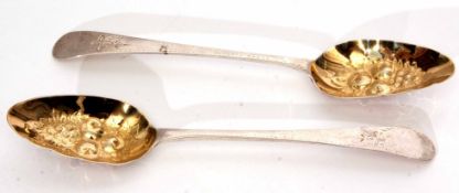 Two George III Old English pattern table spoons with later gilt lined and fruit embossed bowls and