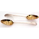 Two George III Old English pattern table spoons with later gilt lined and fruit embossed bowls and