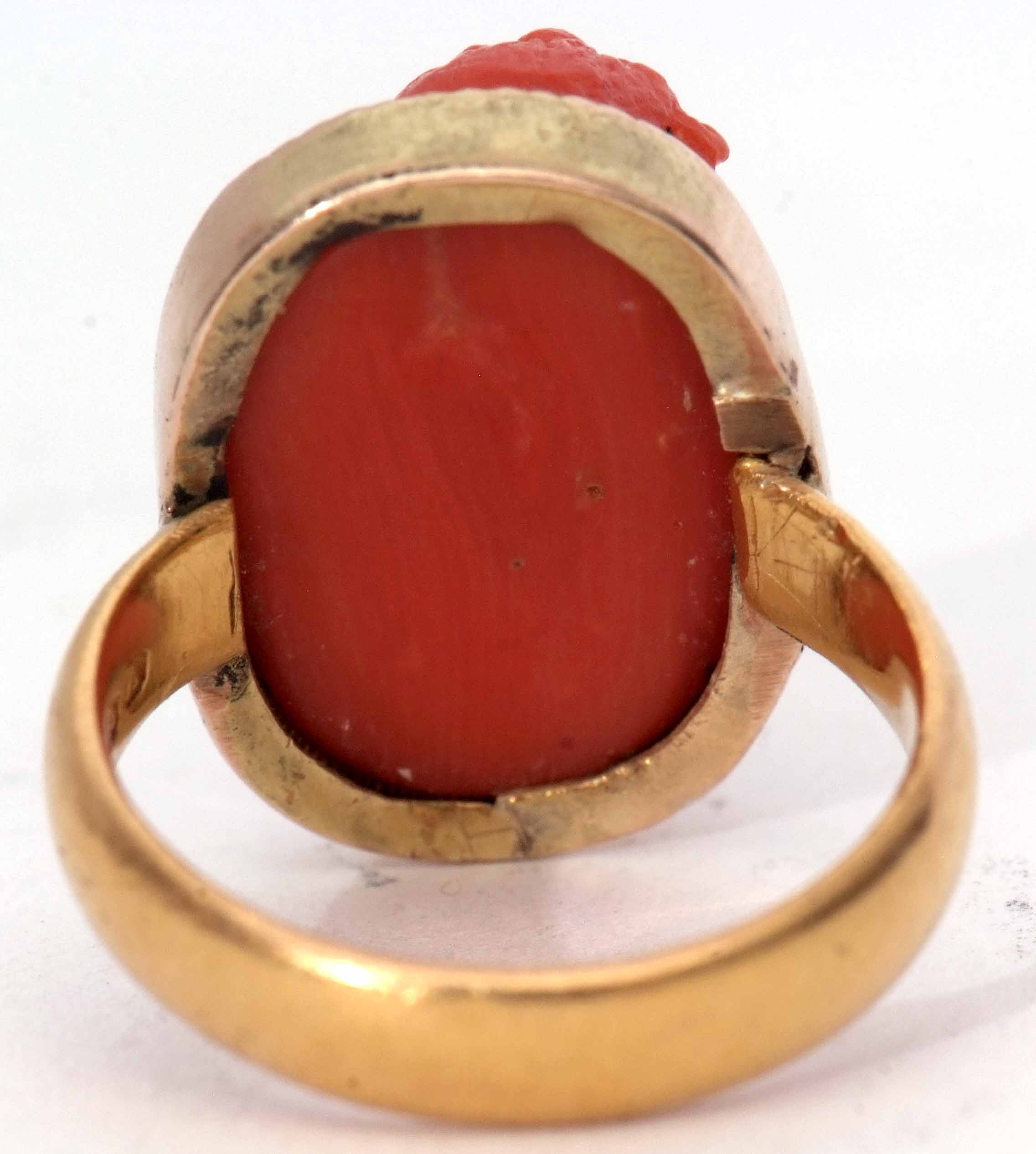 Antique carved coral ring, depicting a classical figure in a yellow metal frame to a 22ct gold - Image 3 of 3