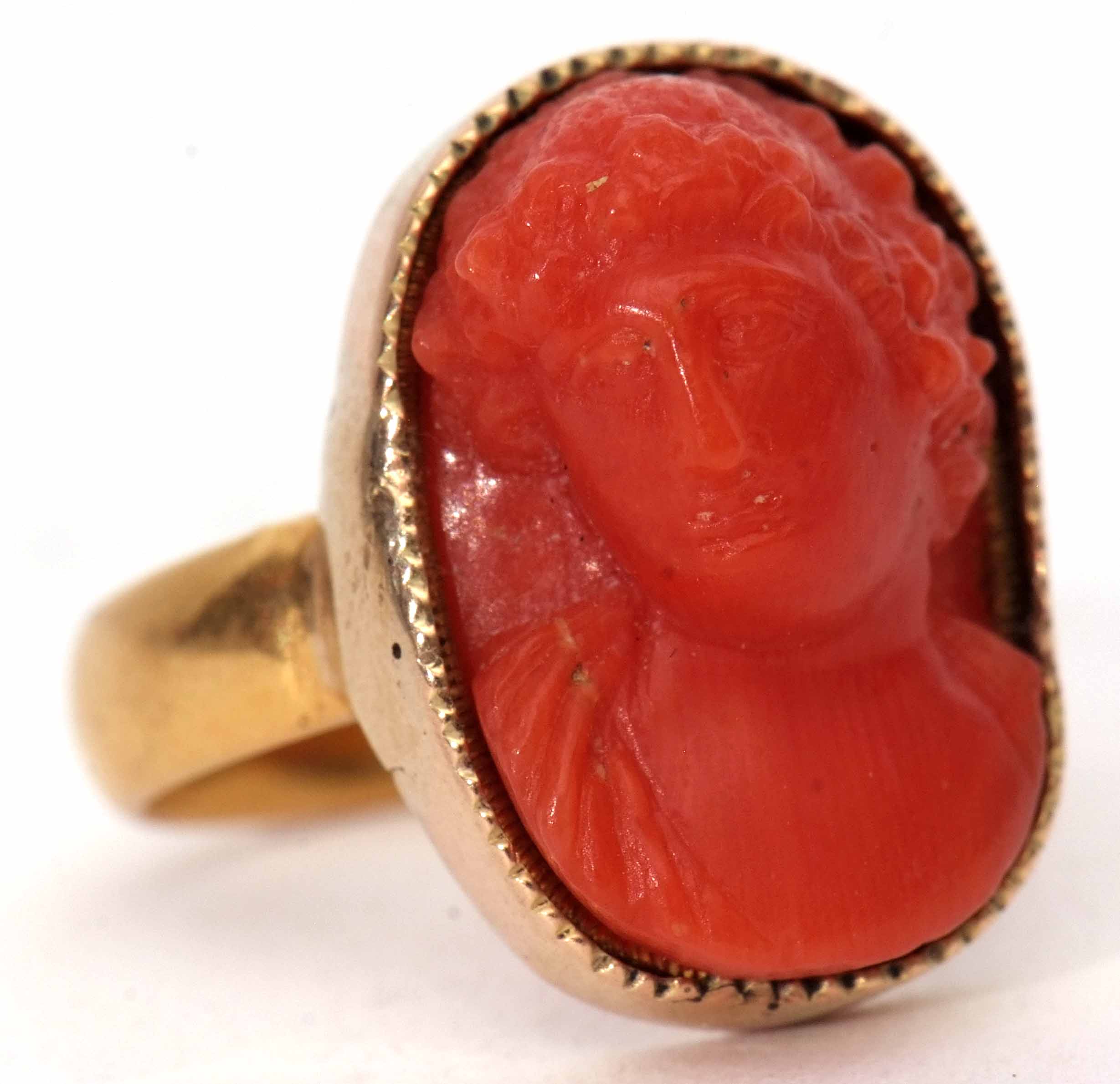 Antique carved coral ring, depicting a classical figure in a yellow metal frame to a 22ct gold - Image 2 of 3