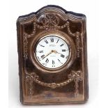Elizabeth II silver mounted easel backed quartz timepiece, the shaped rectangular mount to a