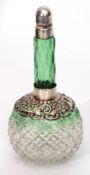 Late Victorian silver mounted globe and shaft toiletry bottle, the graduated green to clear glass