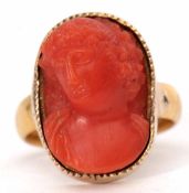 Antique carved coral ring, depicting a classical figure in a yellow metal frame to a 22ct gold