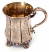 Early Victorian christening mug of waisted cylindrical form with applied rim and C-scroll handle