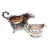 Mixed Lot: comprising a George III milk jug of oval form with flared rim, cast and applied handle