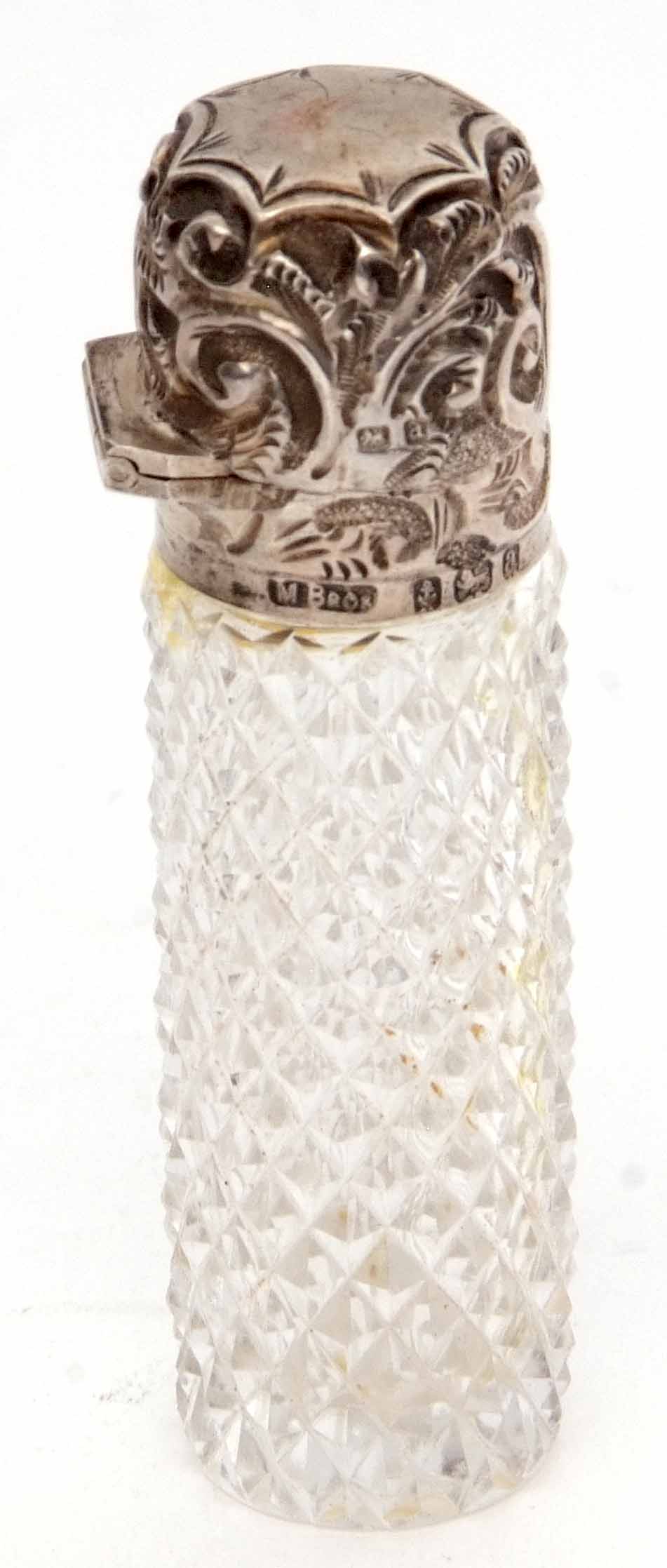 Late Victorian silver mounted and clear glass scent bottle, the cylindrical clear glass diamond