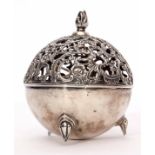 Victorian string box of spherical form, the cast C-scroll and pierced and hinged cover with cast and