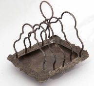 Victorian four-slice toast rack, the rectangular base with embossed rim (a/f) and raised on four