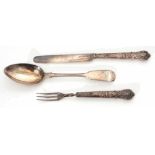 Cased composite three piece christening set, comprising spoon and fork with hollow cast and